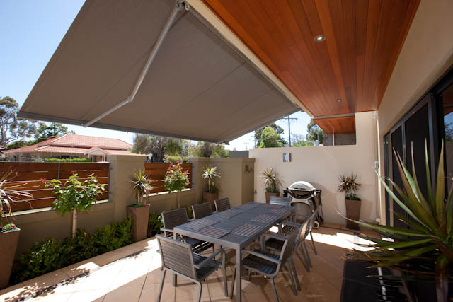 Retractable folding arm awning installed on a Perth home