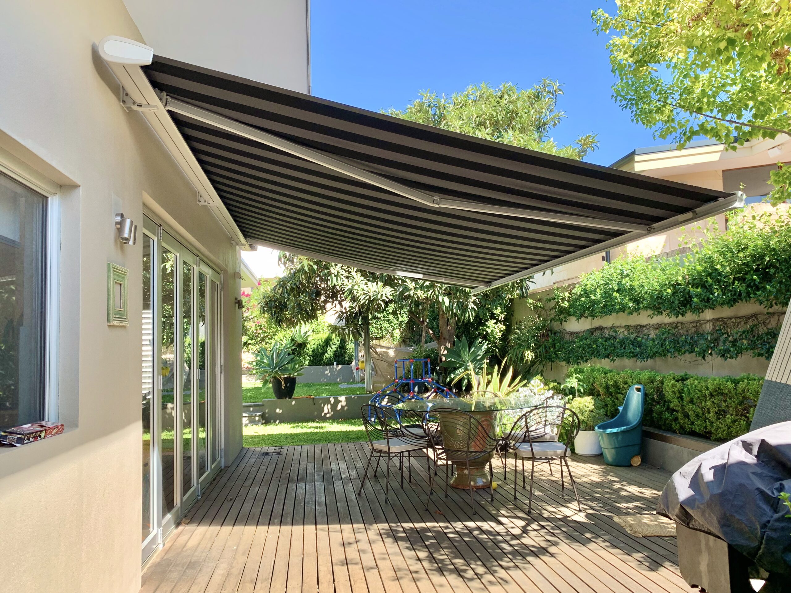 Retractable folding arm awning installation at a Fremantle home