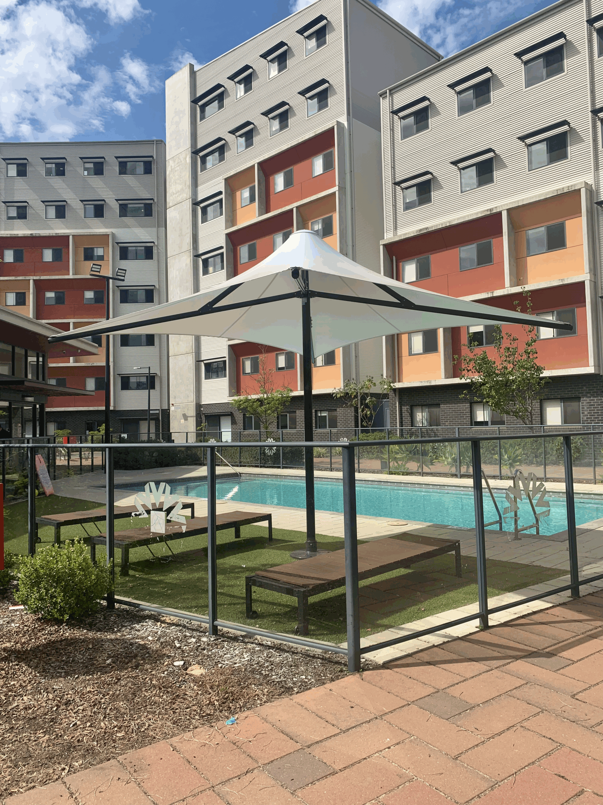 Heavy duty umbrella deployed in a residential Perth outdoor area